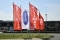 The image shows Viessmann and Carrier flags fluttering in the wind as a symbolic representation of the leadership transition at Carrier Climate Solutions Europe.