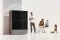 The picture shows a family and a heat pump